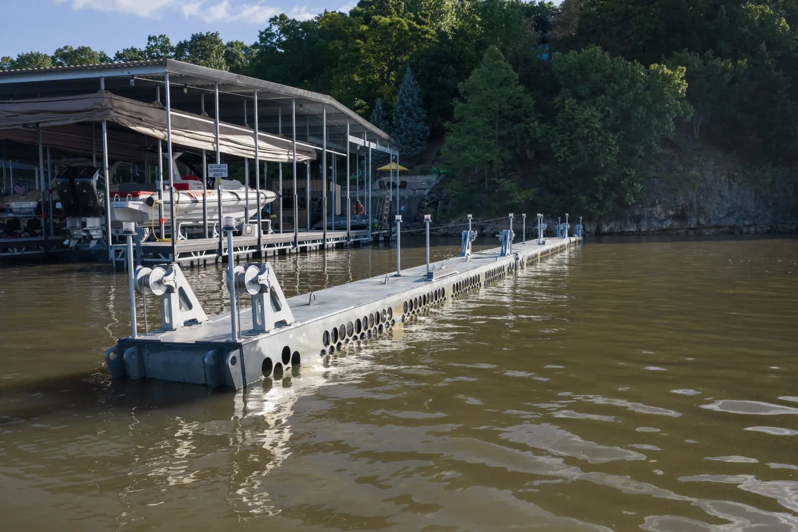 Custom estate dock with concrete decking and swim platform built at Lake of the Ozarks